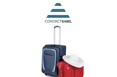 Two suitcases, one blue and one red, with a white hat on top.