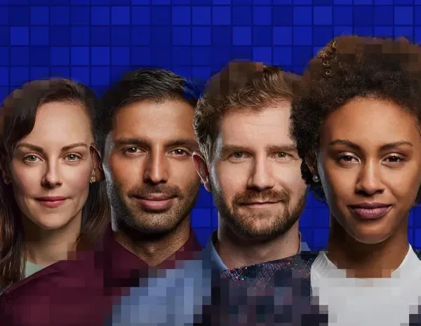 Four virtual agents smiling at camera