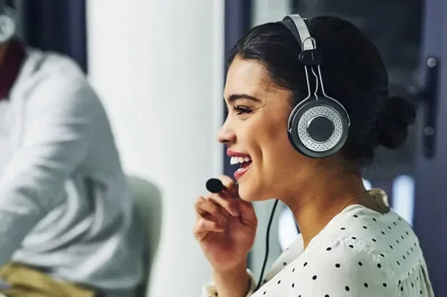 Woman smiling talking on phone