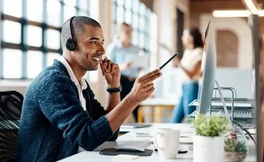 Man Using Headset at Work