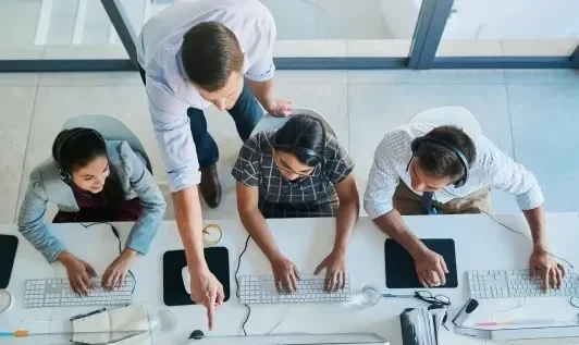 People Working at Desk
