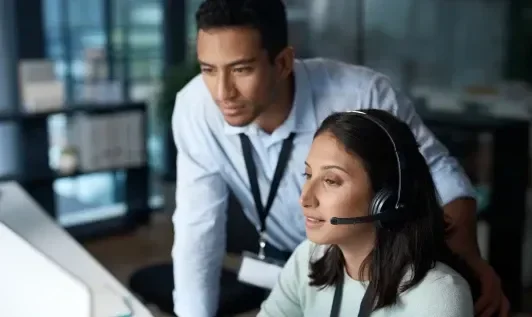 Man and Woman Working at Desk