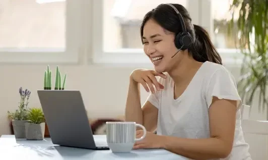 Woman with Laptop on Video Call 